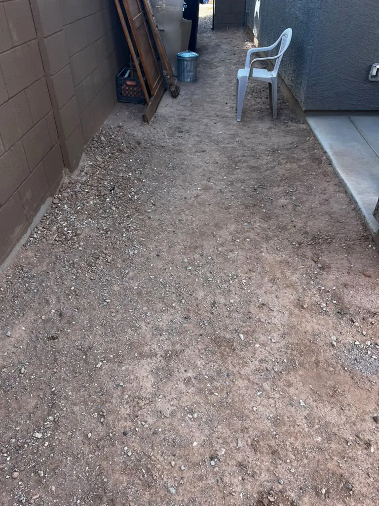 Rock yard raked flat from wall to wall