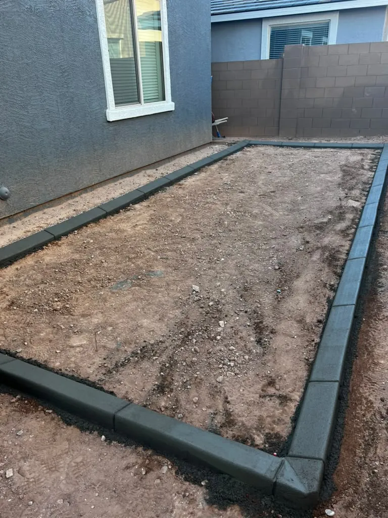 Planter border formed and backfilled, ready for planting